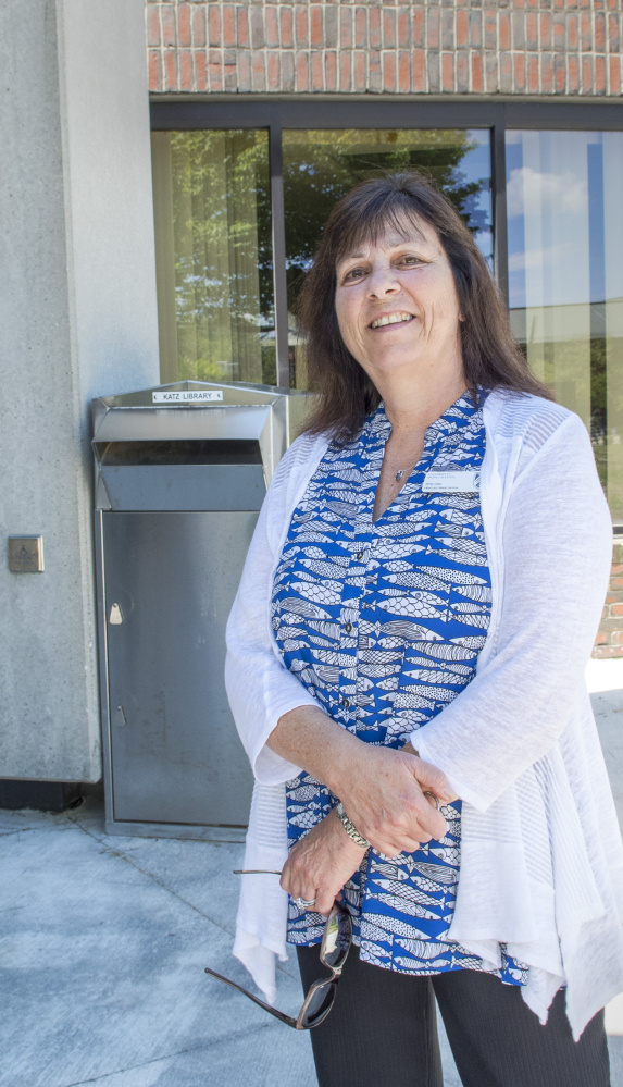 Amy Line, UMA's coordinator of military services, stands near the large room at the college library that will house a new center where veterans can talk and access services.