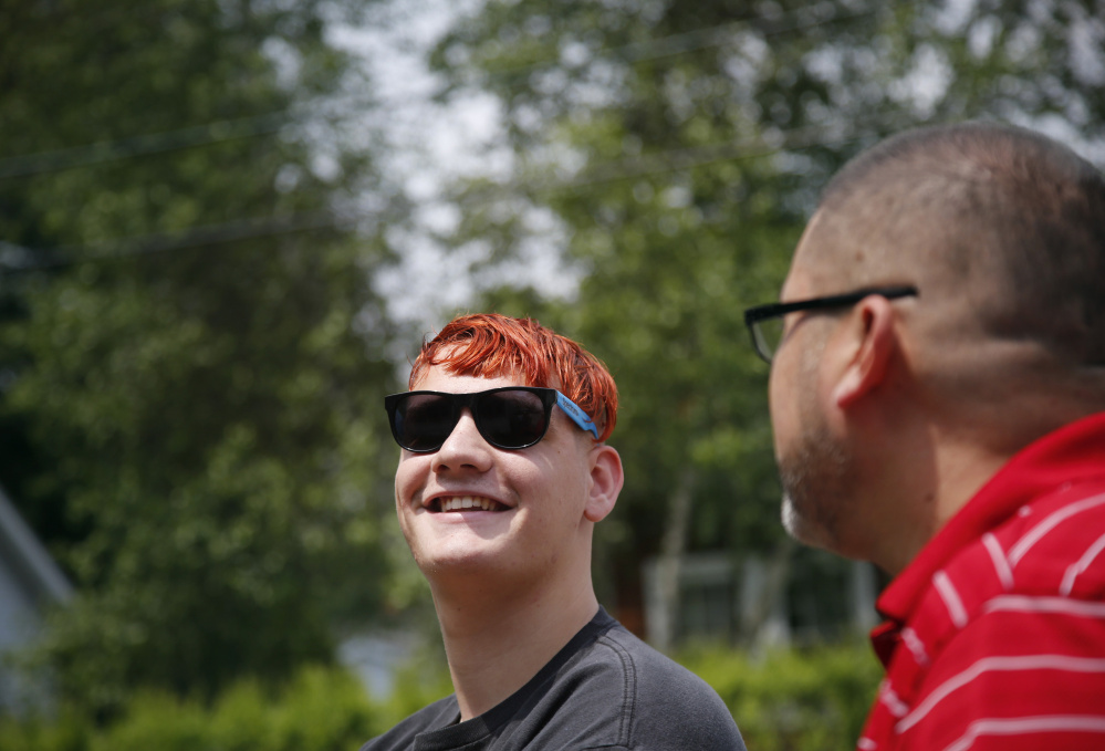 Christopher Segovia visits the Brunswick group home with his father, Luis, on Friday. The Segovias learned in June that Christopher, who has fetal alcohol syndrome, was eligible for Section 21 group home services, and he is now in a transitional home in Rockland.