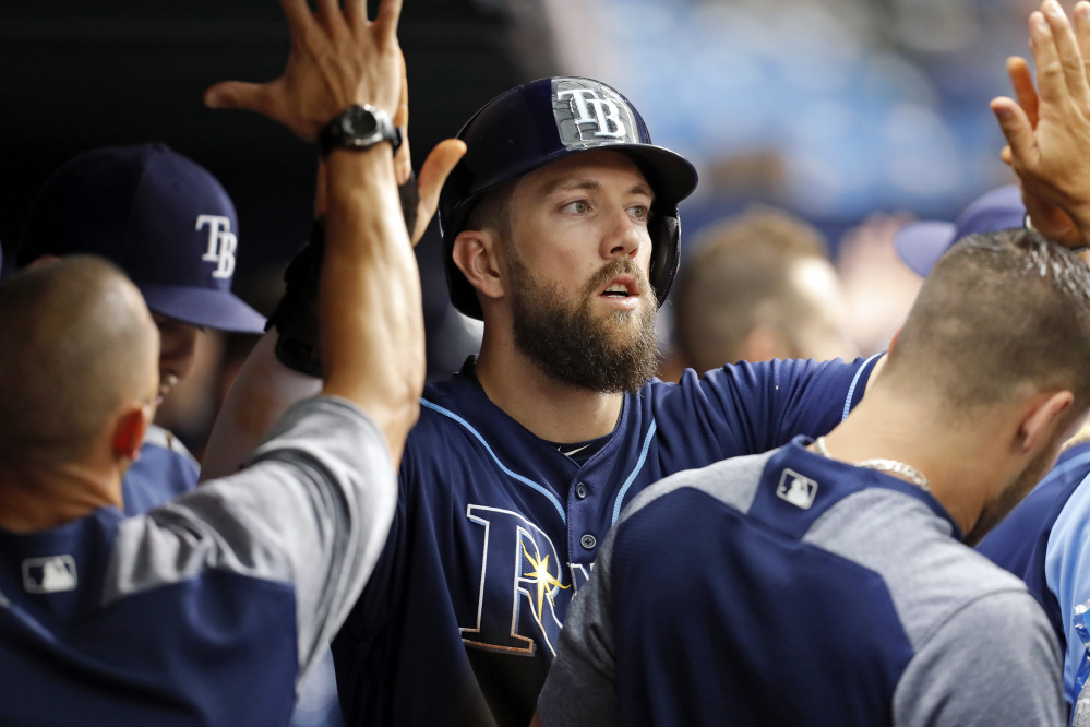 Tampa Bay's Steven Souza Jr. is congratulated after scoring the only run of the game in the second inning on Saturday against the Red Sox in St. Petersburg, Fla. Tampa Bay beat Boston, 1-0. (Associated Press/Mike Carlson)