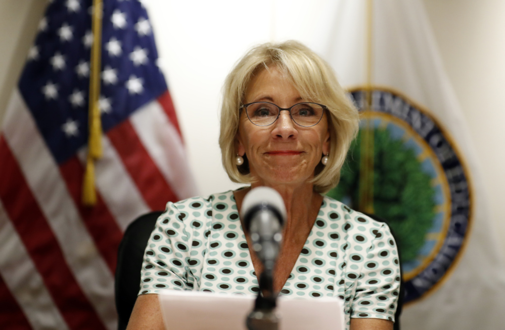 Education Secretary Betsy DeVos prepares to speak with reporters Thursday in Washington.