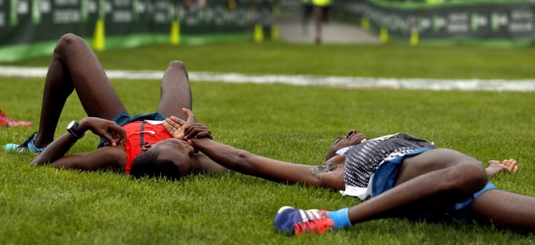 It was a four-man sprint to the finish and Bedan Karoki, left, managed to break the tape for the win ahead of Patrick Makau, right, Ben True and Stephen Kosgei. In the end, all four runners felt the effects.