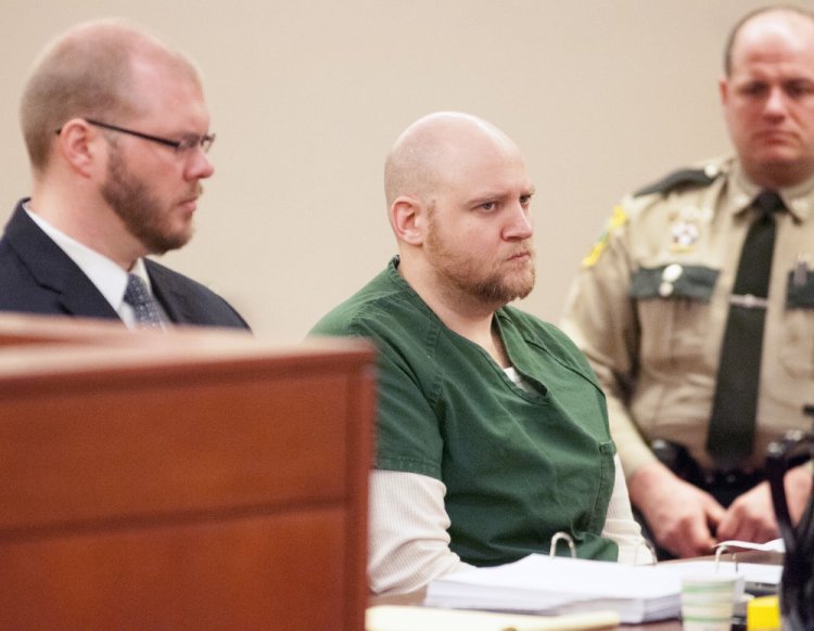 Attorney Scott Hess, left, sits with Wade Hoover during a sentencing hearing Feb. 24, 2016, at the Capital Judicial Center in Augusta.