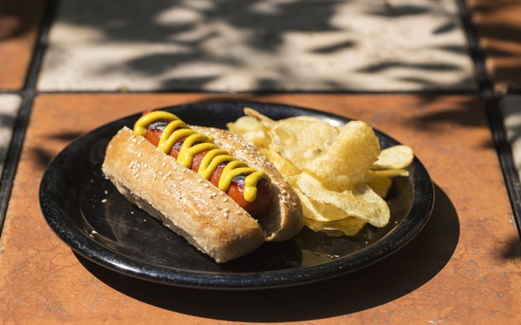 A homemade bun made from a mix of spelt and all-purpose flour makes a summer grill session more sustainable.