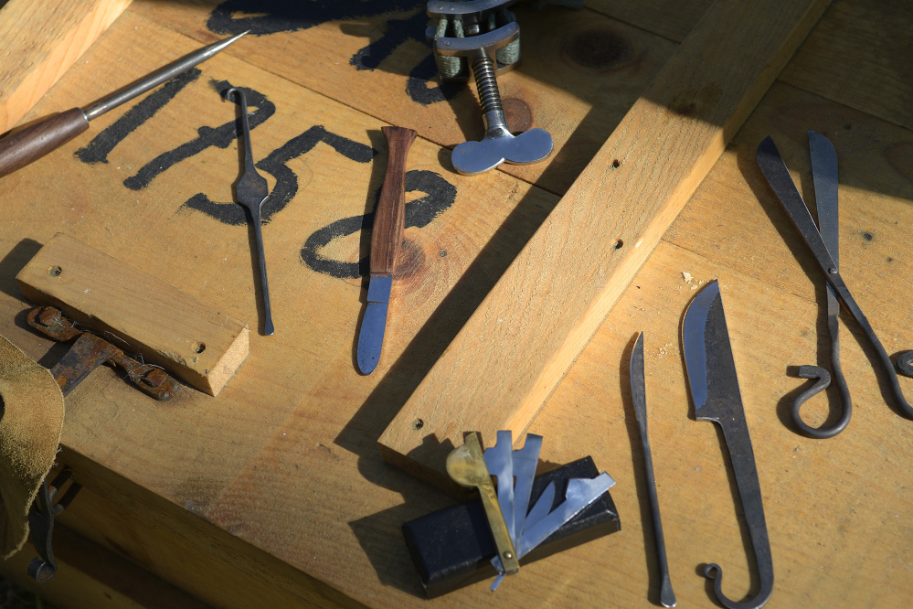 Surgical tools carried by Jackie Fournier of Mount Vernon are displayed Sunday as she portrays Dr. Daniel Cony during the re-enactment held at the Pownalborough Court House in Dresden.