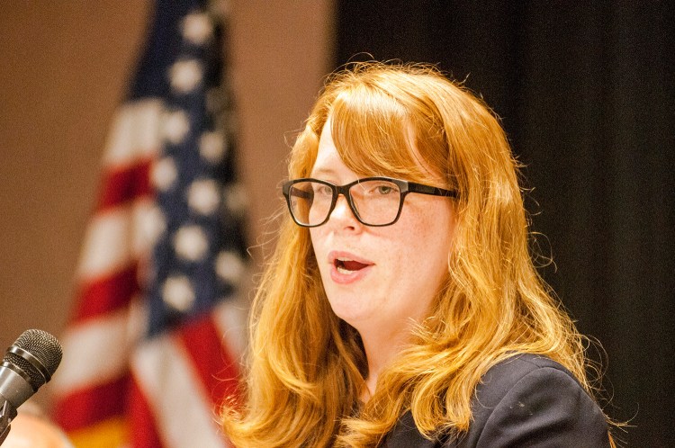 Lydia Paquette, executive director of the Maine Association for Community Service Providers, speaks during a news conference Wednesday at the Augusta Civic Center. 