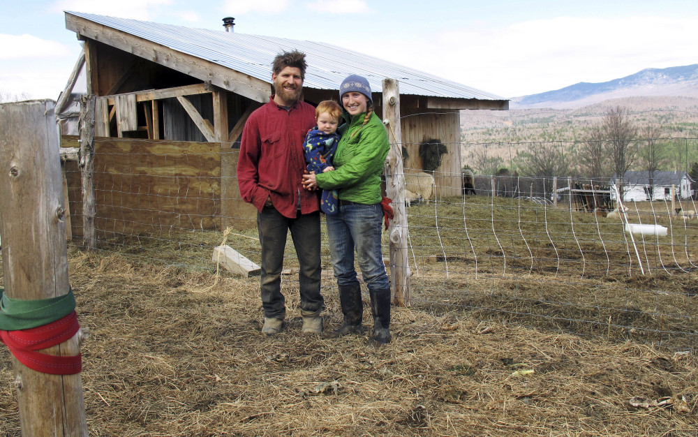 A young family is shown at their farm in Worcester, Vt., in this 2014 photo. A $90,000 National Endowment for the Humanities grant will highlight Vermont farmers who don't fit the stereotype – those who are female, racially diverse or don't necessarily raise dairy cows.