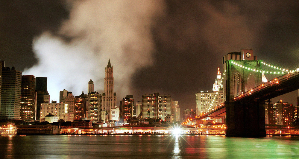 Smoke from the remains of the World Trade Center billows over the Lower Manhattan skyline in 2001. A surveillance program put in place after 9/11 has collected the contents of communications by innocent Americans.