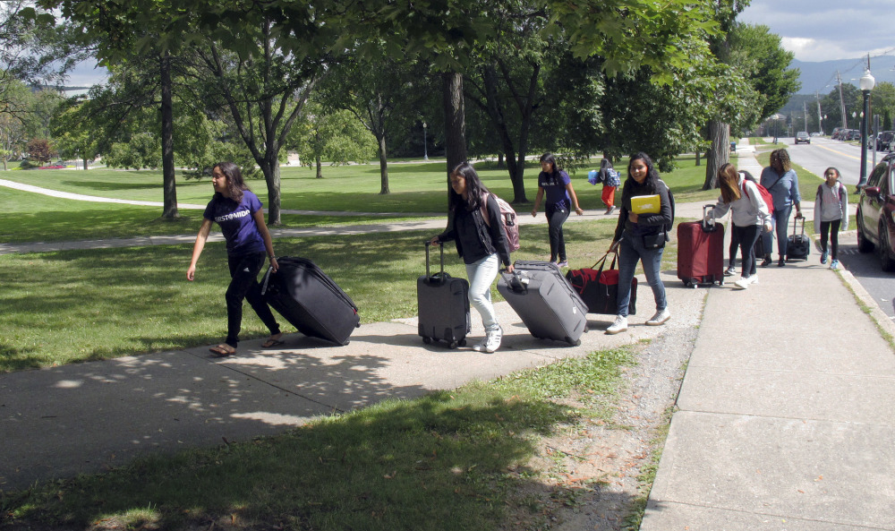 First-generation students arrive at Middlebury College in Vermont late last month. The school is one of the many colleges across the country with special programs to help ease the transition for students who are the first in their families to attend college.