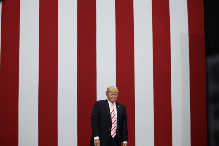 President Trump arrives for a campaign rally for U.S. Senate candidate Luther Strange on Friday in Huntsville, Ala.