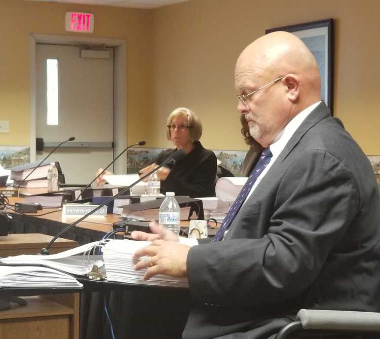 Lewiston oral surgeon Jan Kippax testifies before the Maine Board of Dental Practice in Augusta on Saturday in a hearing that may determine whether he's allowed to continue to practice.