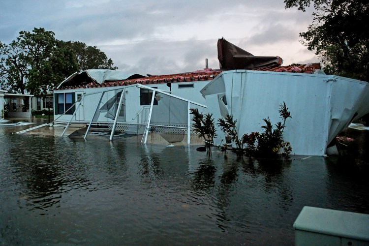 Floodwater from Hurricane Irma surrounds a mobile home in Bonita Springs, Florida, Sunday.  