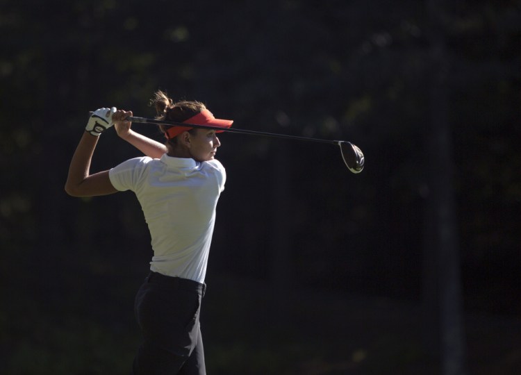 Elizabeth Lacognata drives the ball on the first hole Wednesday during the SMAA Championship at Sable Oaks Golf Club. The senior is Scarborough High School's No. 2 player. Last season, Maine had 130 female high school golfers, buoyed by state and national efforts to bring them into the fold.