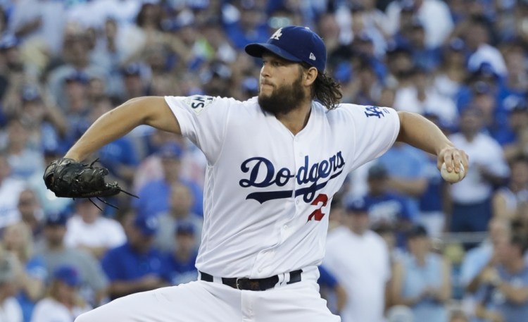 Los Angeles Dodgers starting pitcher Clayton Kershaw throws during the first inning of Game 1 of the World Series against the Houston Astros on Tuesday in Los Angeles.