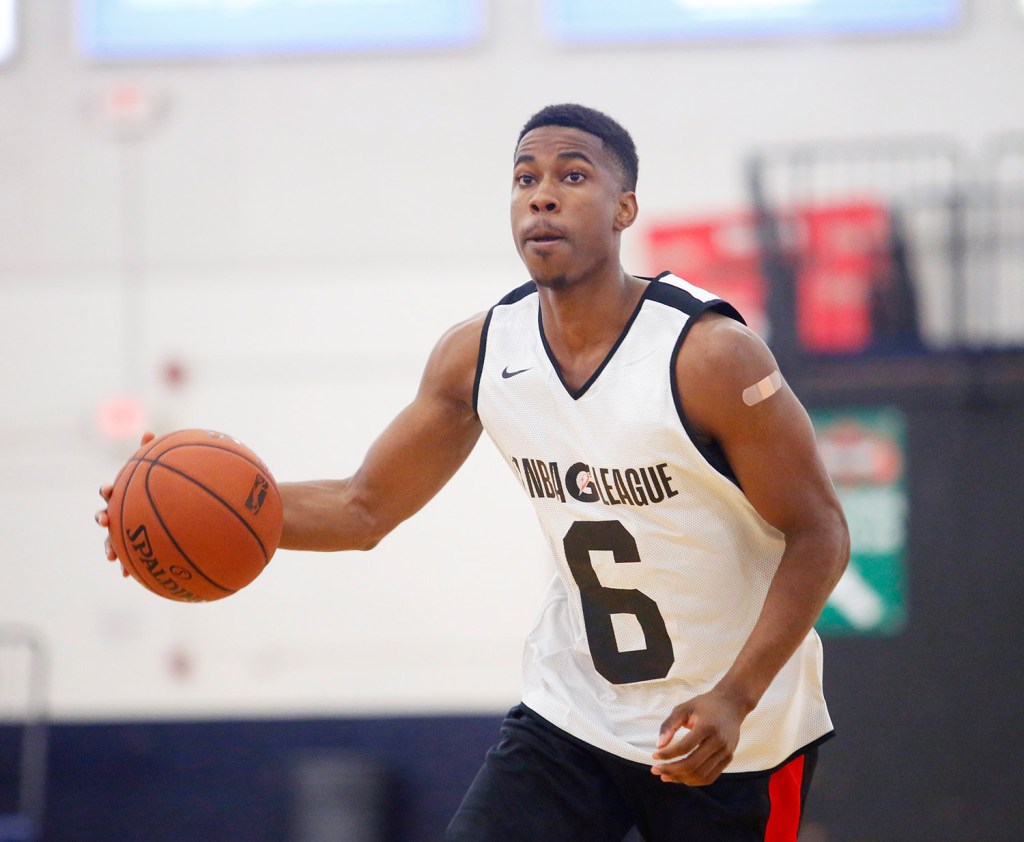 Daniel Dixon handles the ball during opening day of training camp for the Red Claws.