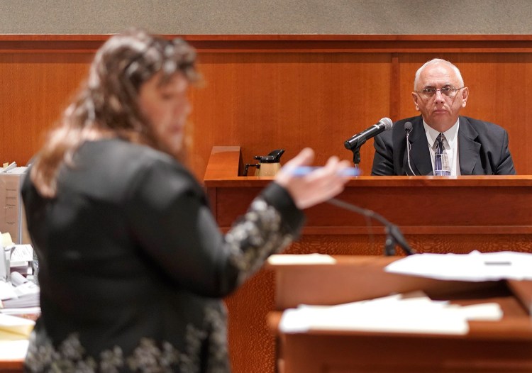 Anthony Sanborn's attorney Amy Fairfield questions retired Portland detective James Daniels on Thursday at the Cumberland County Courthouse. Daniels, who was the lead detective in the Jessica Briggs murder investigation, testified that he had information about a man who knew Briggs and was angry that she had refused to be a prostitute for him and broken up with him.