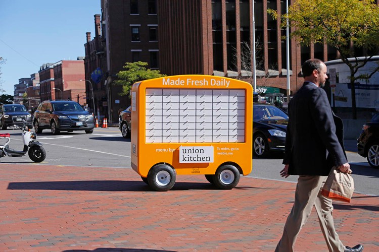 This Veebie fresh food kiosk was parked at the corner of Middle  and Temple streets during lunchtime Tuesday. The kiosk, with a daily changing menu, was serving food from Union Kitchen. Four other vendors will stock the kiosk on other weekdays: Daily Greens on Mondays; Sisters Gourmet Deli, Wednesdays; b.Good, Thursdays; and Foodworks, Fridays.