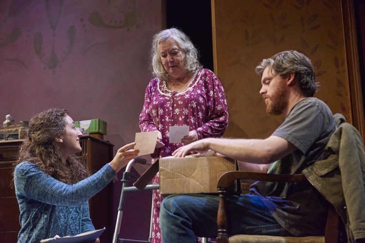 Katie O. Solomon as home health aide Lucy, Maureen Butler as Elizabeth and Erik Saxvik as Teddy in "Complications from a Fall" at Portland Stage.