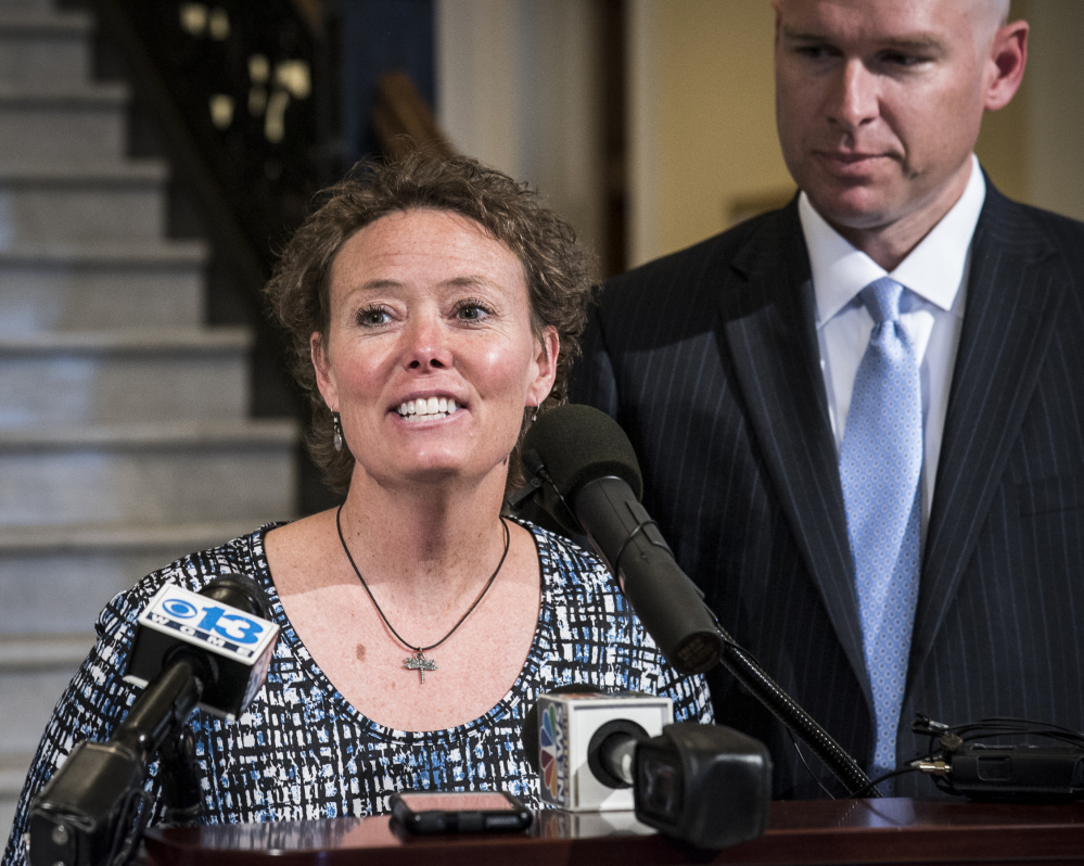 Toni Richardson, an education technician in the Augusta School Department, talks to reporters in the State House earlier this year. She is joined by attorney Jeremy Dys. left, of the First Liberty Institute, a legal organization that specializes in defending religious freedom.