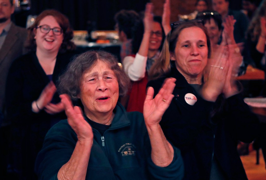 Supporters of Medicaid expansion cheer on Election Day in November while awaiting results at the Mainers for Health Care party in Portland. Voters decided to join 31 other states and expand Medicaid under the Affordable Care Act, but Gov. Paul LePage has insisted that the Legislature fund expansion costs without tapping into the state’s rainy day fund or increasing taxes. 