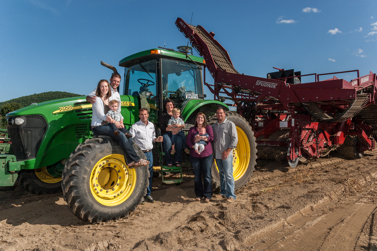 A portrait of three generations at Green Thumb Farms in West Fryeburg. From left:  Julie and Brian Thibodeau with Brett; Donnie and Brenda Thibodeau, with grandson Garrett Pitreau; and Betsy and Jim Pitreau, with daughter Kyla. Not pictured is Tucker Thibodeau, now age 2.