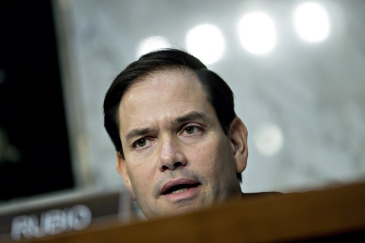 Sen. Marco Rubio, R-Fla., seen here in November, signaled he would vote for Republicans' tax plan Friday after last-minute changes.