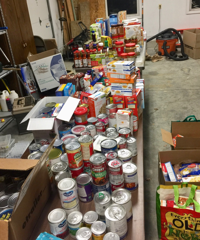 Richmond-area residents donated 1,280 food items at the town's tree-lighting ceremony Friday, after Quincy Emmons, 7, and Brady Alexander, 11, sent out word they were hoping to collect food for those who need help this Christmas.