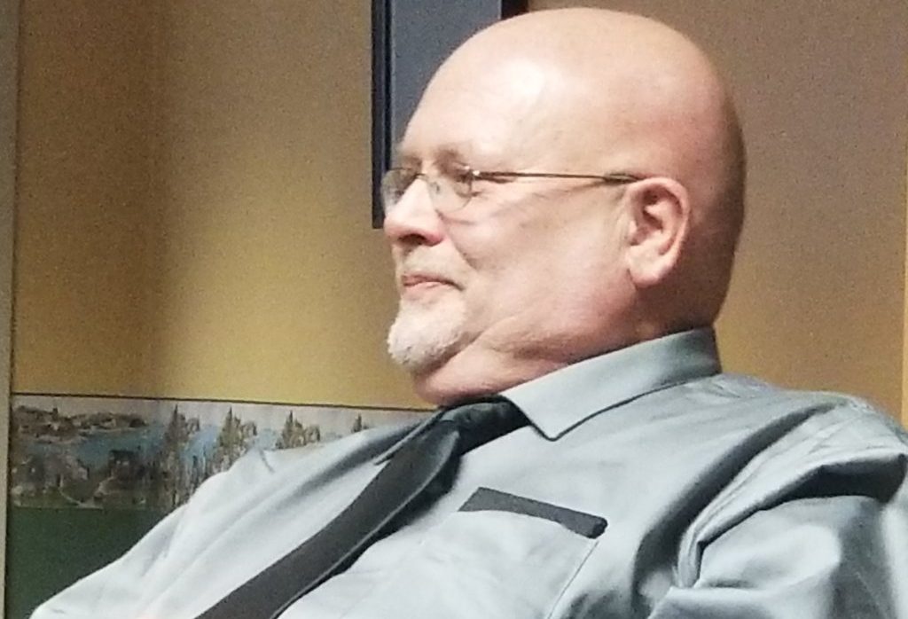 Dr. Jan Kippax listens at his hearing on Dec. 29, when the Maine Board of Dental Practice cleared him of all the charges remaining against him.