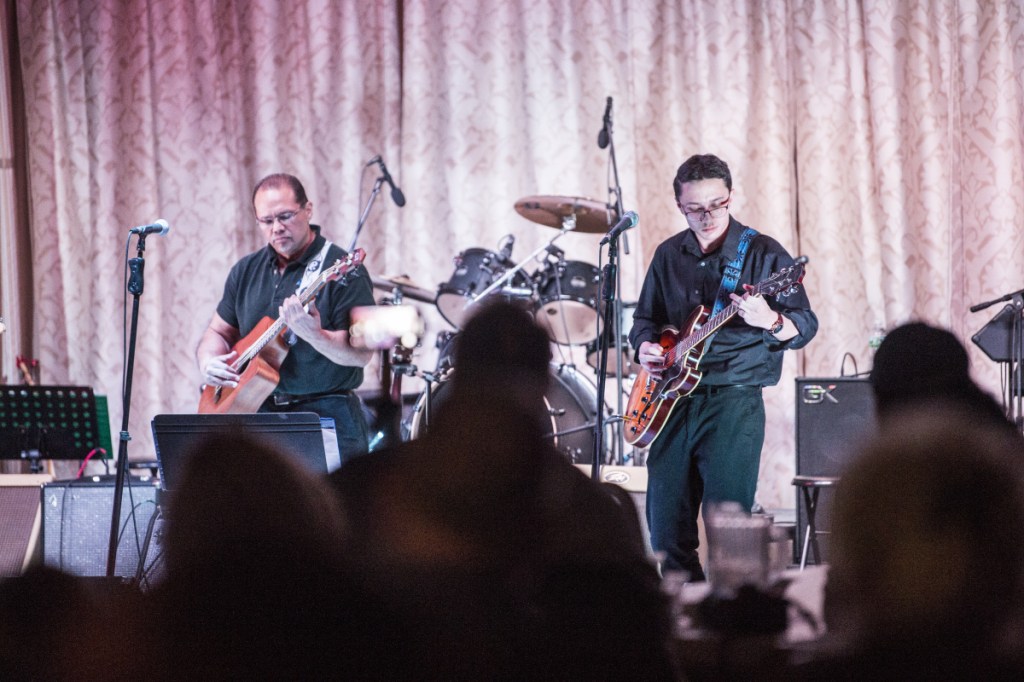 Kevin Michaud, left, and his son, Armando Michaud, perform at the Operation HOPE benefit concert at the Elks Lodge in Waterville on Saturday. The benefit was used to raise money for people suffering from substance abuse disorder.