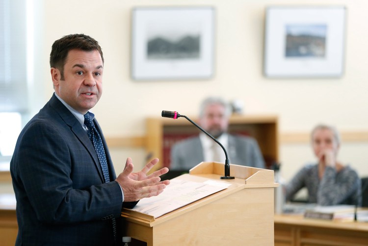 Mark Dubois, natural resource manager for Poland Spring, speaks at Wednesday's hearing on his nomination to the state's Board of Environmental Protection. Activist groups critical of Poland Spring's parent company, Nestle Waters, said the multinational corporation has no place on a board that in part oversees Maine's water supply.