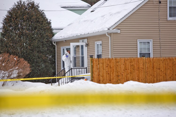 Portland police detectives and Major Crimes Unit personnel work at the scene at 46 Dorothy St. investigating the circumstances of a person's death.