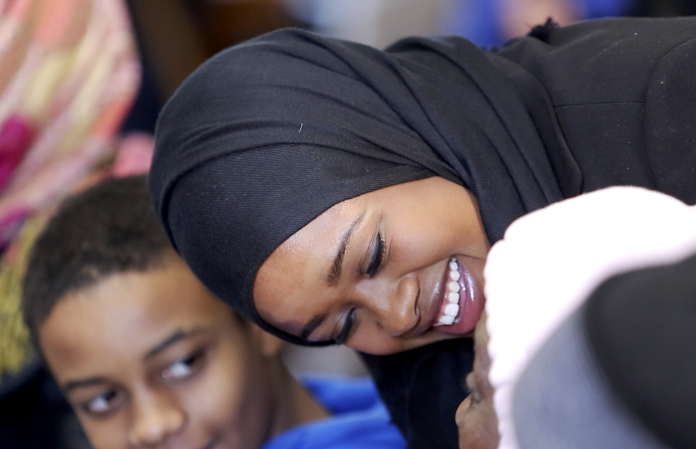 Zahra Abu, shown at her swearing-in ceremony as a Portland police officer in 2016, was arrested at a concert venue in Worcester, Massachusetts, on Saturday night. Police say she assaulted other customers and grabbed the venue's head of security.