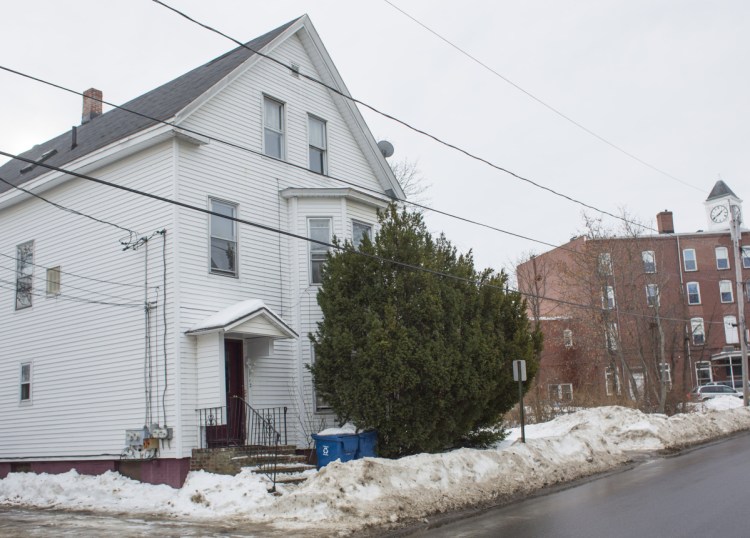 Code violations found in the five-apartment building at 112 Woodford St. included a lack of smoke detectors, obstructed exits, electrical problems, bed bugs and leaky sewer pipes.