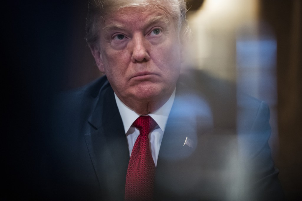 President Trump listens during a meeting with law enforcement officials at the White House last week.