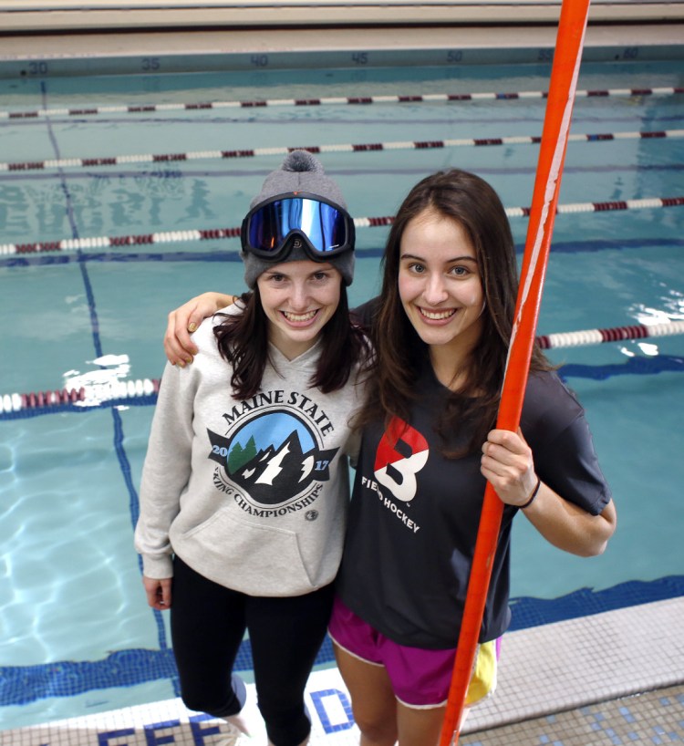 Greta Van Curan, left, and Maggie McCormick of Greely are two-sport athletes – this winter alone. In addition to swimming, Van Curan is an Alpine ski racer and McCormick is a pole vaulter.