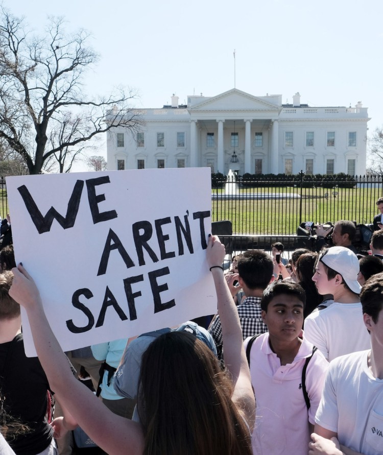 High school students gather in front of the White House on Wednesday to protest gun violence. They should seek nothing less than a ban on firearms.