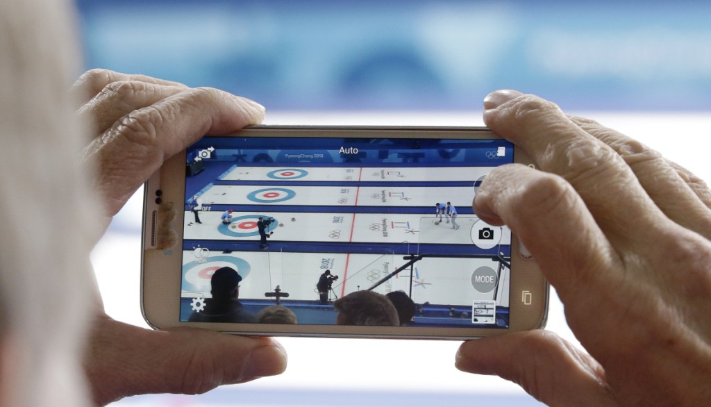 There were plenty of eyes and phones trained on curling when John Shuster's shot gave the U.S. a five-point end and a gold medal. Among those cheering Team USA were Mr. T, Aaron Rodgers and J.J. Watt.