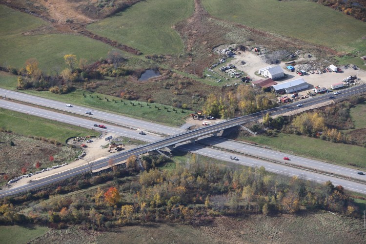 The Winthrop Street Bridge in Hallowell, shown spanning the Maine Turnpike, was rehabbed with the help of design firm VHB, and re-opened ahead of schedule last Oct. 20.