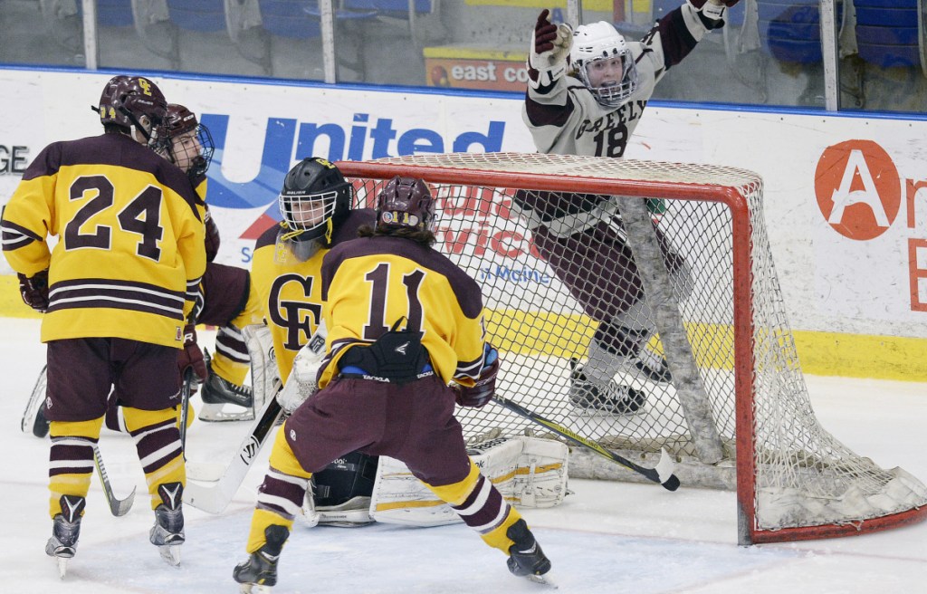 Greely's Jake MacDonald celebrates after scoring in the third period Tuesday in Lewiston. The goal turned out to be the winner.