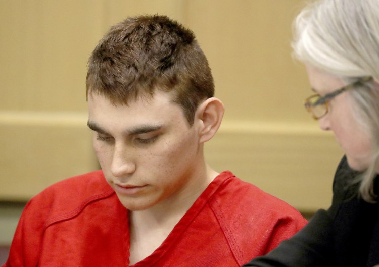 Nikolas Cruz, accused of murdering 17 people in the Florida high school shooting, appears in court last month. Prosecutors say they will seek the death penalty.