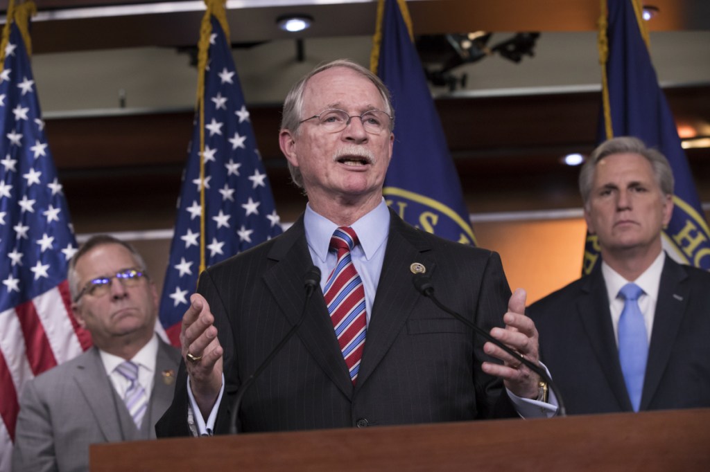 Rep. John Rutherford, R-Florida, flanked by, Rep. Mike Bost R-Illinois, left, and Majority Leader Kevin McCarthy, R-California, talks about his bill, the "STOP School Violence Act of 2018," which the House overwhelmingly approved to improve school safety. It's the first gun-related action by Congress since the Feb. 14 shooting that left 17 dead at a Florida high school, at the Capitol in Washington on Wednesday.