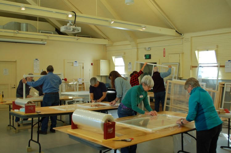 Volunteers build window inserts at Wells Reserve at Laudholn Farm in 2017.