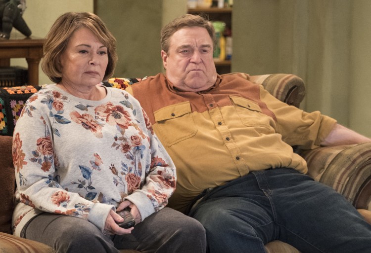 Roseanne Barr and John Goodman appear in a scene from the reboot of "Roseanne," premiering on Tuesday.