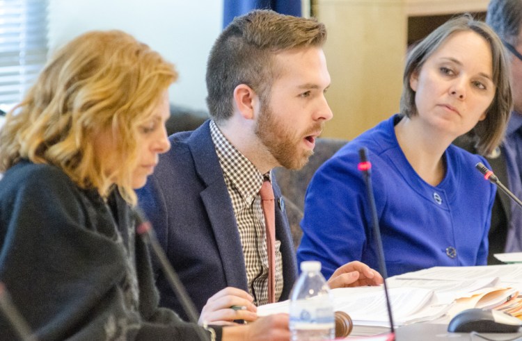 Sen. Amy Volk, R-Scarborough, left, and Rep. Ryan M. Fecteau, D-Biddeford, co-leaders of the Joint Standing Committee on Labor, Commerce, Research and Economic Development, and panel member Sen. Shenna Bellows, D-Manchester, take part in a work session March 6 in the Burton M. Cross State Office Building in Augusta. The committee has been addressing an unemployment law dealing with employers paying into the system and concerns about the operation of the new unemployment compensation claims system.