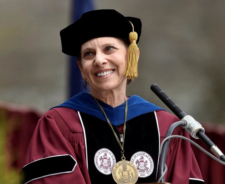 Kathryn Foster, University of Maine at Farmington president, smiles after introducing the recipient of an honorary degree at last year's commencement in Farmington. Foster is leaving June 30 after six years of leading the university.