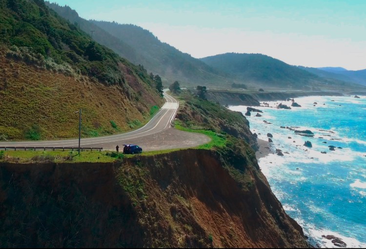 Aerial image shows the pullout where the SUV of Jennifer and Sarah Hart was found off the Pacific Coast Highway near Westport, Calif. The bodies of the two women and three of their adopted children were recovered, while three more of their children remain missing.