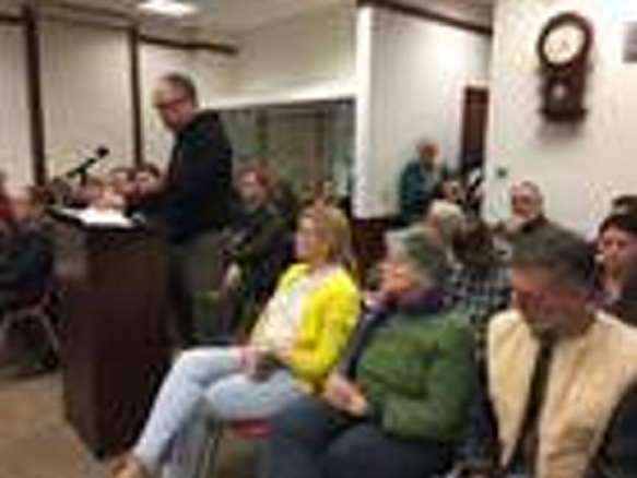 New Gloucester resident Michael Rawlings-Sekunda, at the podium, filed one of three appeals related to Day One's proposed youth residential treatment facility on Intervale Road. (Matt Junker/The Forecaster)