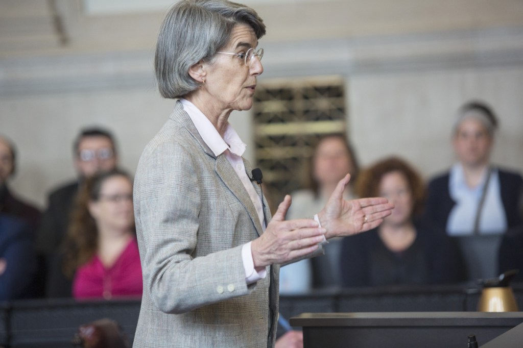 Assistant Attorney General Phyllis Gardiner, representing the Secretary of State's Office,  addresses the high court. The office needs a ruling soon so it can prepare primary ballots.