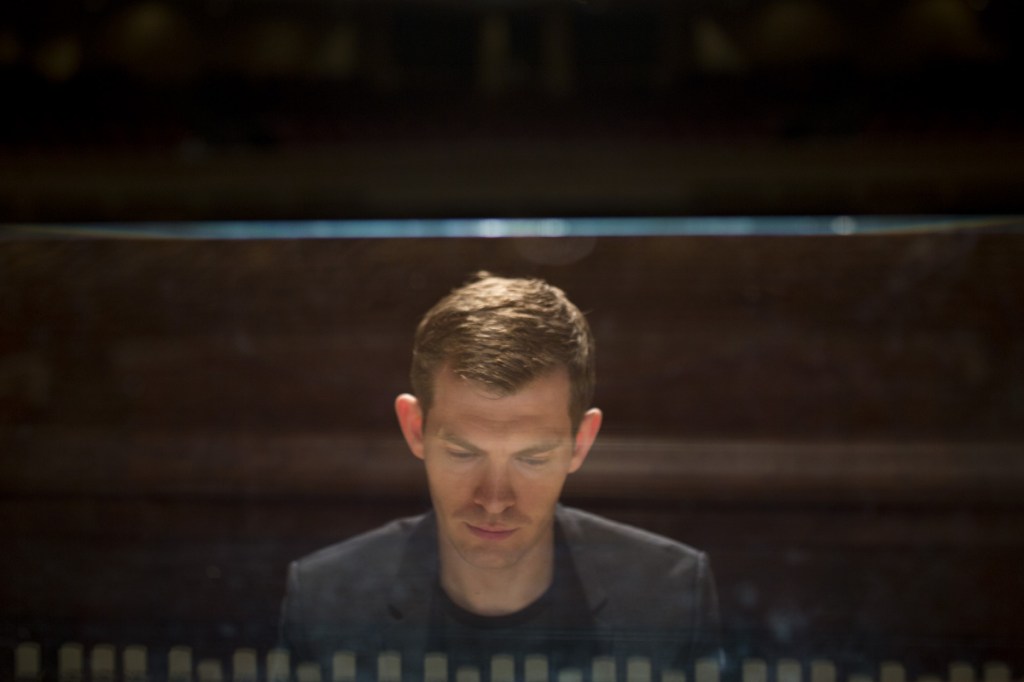 James Kennerley, Portland's new municipal organist, plays the Kotzschmar organ at Merrill Auditorium on April 6. The 33-year-old will perform Wednesday for the first time since his selection as Portland's 11th municipal organist. Kennerley wants to bring people out of their homes, arenas and movie theaters and into the concert hall. "This organ can do things those speakers could never do," he says. Staff photo by Brianna Soukup