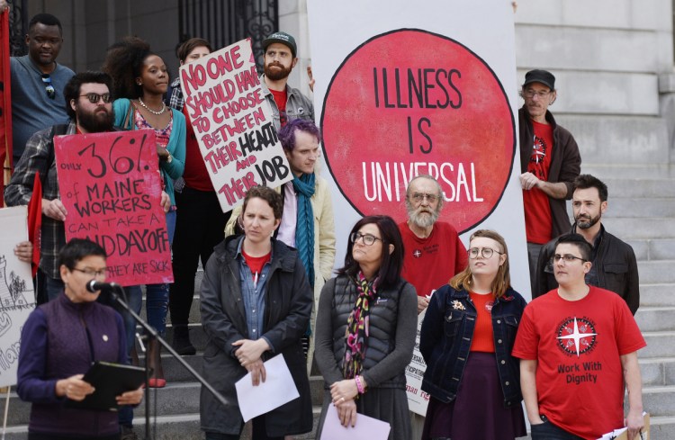 Supporters of a proposed ordinance mandating paid sick time for workers in Portland rally Tuesday outside City Hall. A business owner says it's not the government's job to dictate benefits.