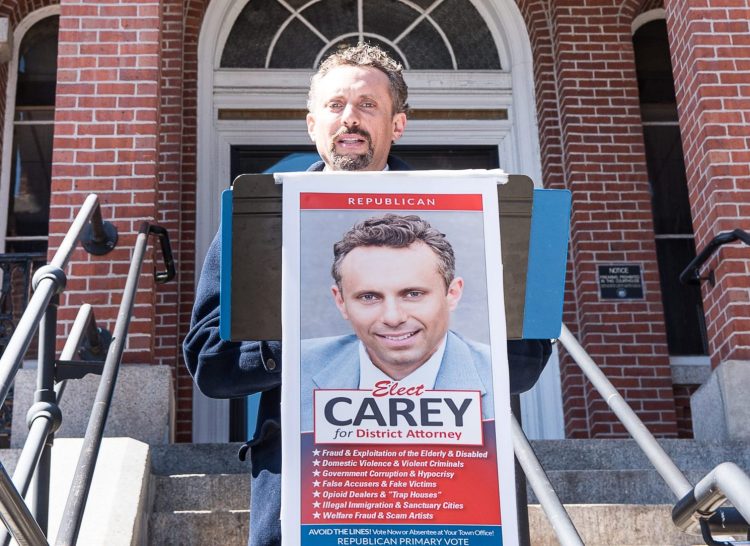 Auburn attorney Seth Carey holds a news conference on the steps of the Androscoggin County Building in Auburn on April 9. 